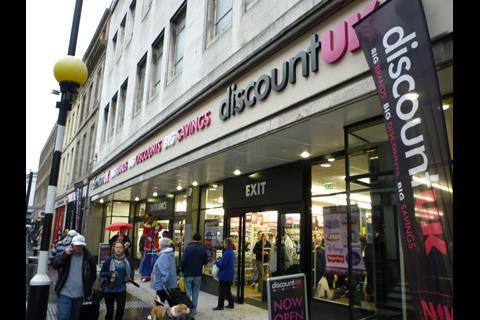 Newcastle-upon-Tyne Woolworths, shown here in November 2011, is now a Poundworld-owned Discount UK - pictured here on opening day.